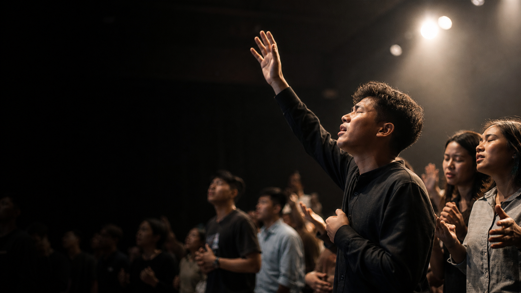 Young adults worshipping together at Sukawarna Legacy